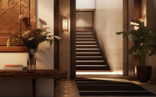 Elegant hallway with a staircase and decorative wooden accents.